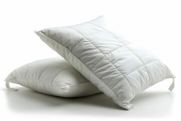 Two white pillows isolated on white background.