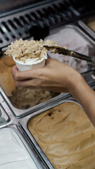 Put ice cream in a paper cup