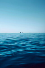 Serene Blue Ocean with Distant Boat Under Clear Sky Reflecting Tranquility and Freedom