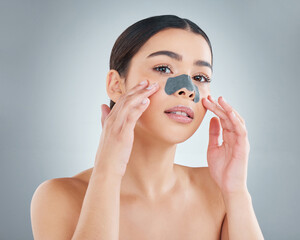 Woman, nose strip and portrait in studio for skincare, cleansing and pores maintenance for self...