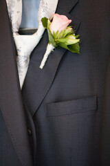 Elegant suit jacket with white rose boutonniere, perfect for weddings and formal events ideal for...