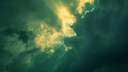 Shades of lime mint and jade illuminate the sky as the suns final rays pierce through the clouds.