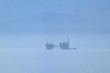 marine oil extraction platform in the morning fog - Prinos oil area, near Thassos, Greece, Aegean sea