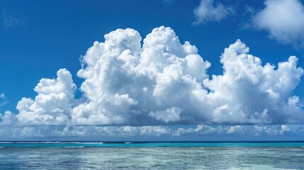 Cloud filled sky above the blue ocean