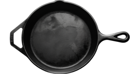 A frying pan with a sturdy handle placed on a clean white surface