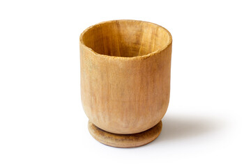 Antique wooden bowl on a white background. With a shadow. A simple wooden bowl close-up.