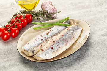 Marinated herring fillet with green onion