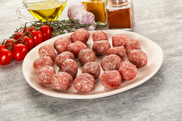Uncooked raw beef meatball minced