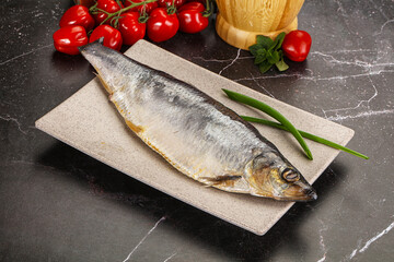 Whole raw salted herring fish