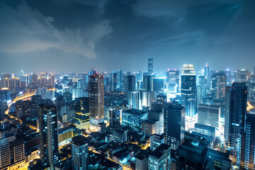 Obraz premium City Skyline at Night: Aerial View of Illuminated Skyscrapers
