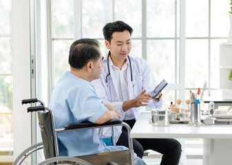 Fototapeta premium Asian smart man, doctor and elderly patient tablet and results for health, advice and report. Kindliness medic, mobile touch screen with smile, tech or support in hospital. Healthcare concept.