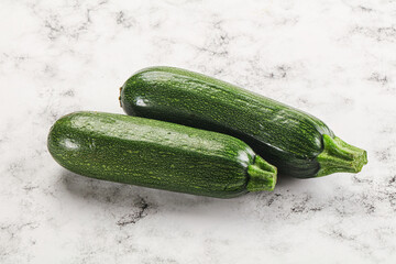 Raw green ripe zucchini vegetable