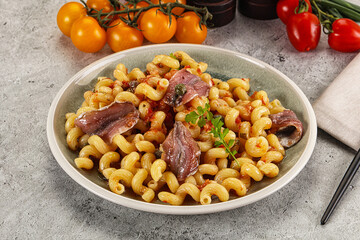 Italian pasta cellentani with anchovy
