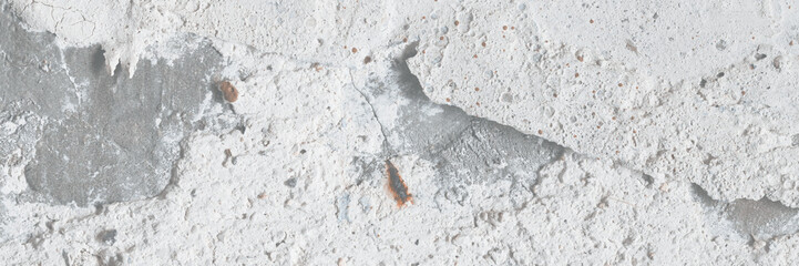 Old wall with cracked stucco. Weathered rough surface. Vintage texture great for background and...
