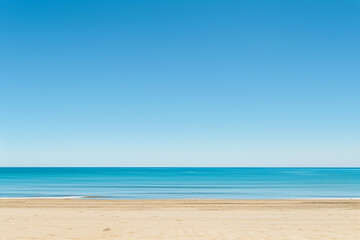 Fototapeta premium Sunlit Beach with Blue Sky and Ocean View
