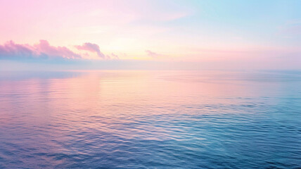 Obraz premium a serene seascape at dawn, with soft pastel colors reflecting off the calm waters