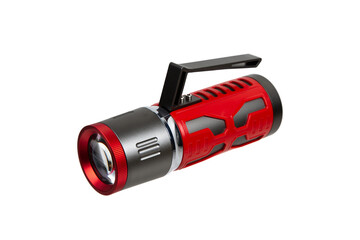 Modern metal LED flashlight in red color. Portable flashlight isolate on a white back