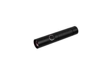 Modern metal LED flashlight in black color. Portable flashlight isolate on a white back