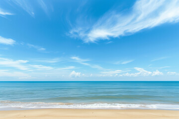 Fototapeta premium Sunlit Beach with Blue Sky and Ocean View