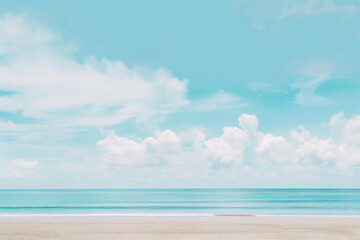 Obraz premium Sunlit Beach with Blue Sky and Ocean View