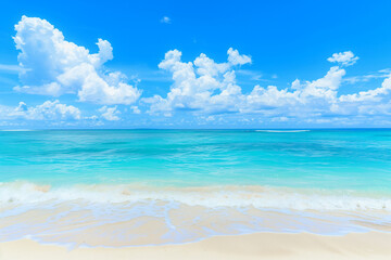 Obraz premium Sunlit Beach with Blue Sky and Ocean View