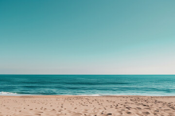 Obraz premium Sunlit Beach with Blue Sky and Ocean View