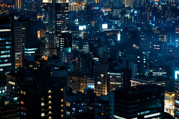 City Skyline at Night: Aerial View of Illuminated Skyscrapers