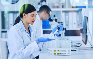 Lab, scientist and woman with pipette for test on desk, liquid and research on chemical, gloves or coat. Clinic, medical and people with science, computer and exam for healthcare, medicine or results