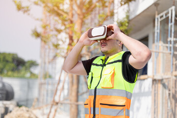 Engineer man Construction Worker Using VR Headset on Job Site