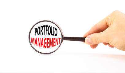 Portfolio management symbol. Concept words Portfolio management in beautiful magnifying glass....