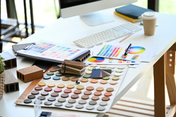 Interior designer working table with material sample and color swatches