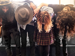 Stage, rock band and bow after concert, performance and festival event in Los Angels. Group of...