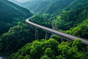 Obraz premium Aerial view of a single bridge spanning a valley. 