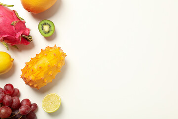 Set of tropical fruits on white background, space for text