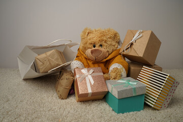 Teddy bear with boxes, gifts.