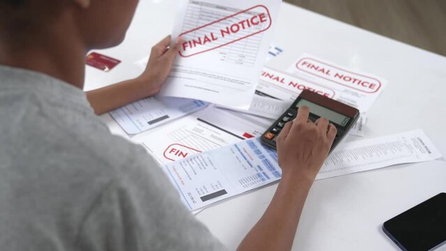 Stressed young woman has financial problems with credit card debt to pay crucial show concept of bad personal money and mortgage pay management crisis.