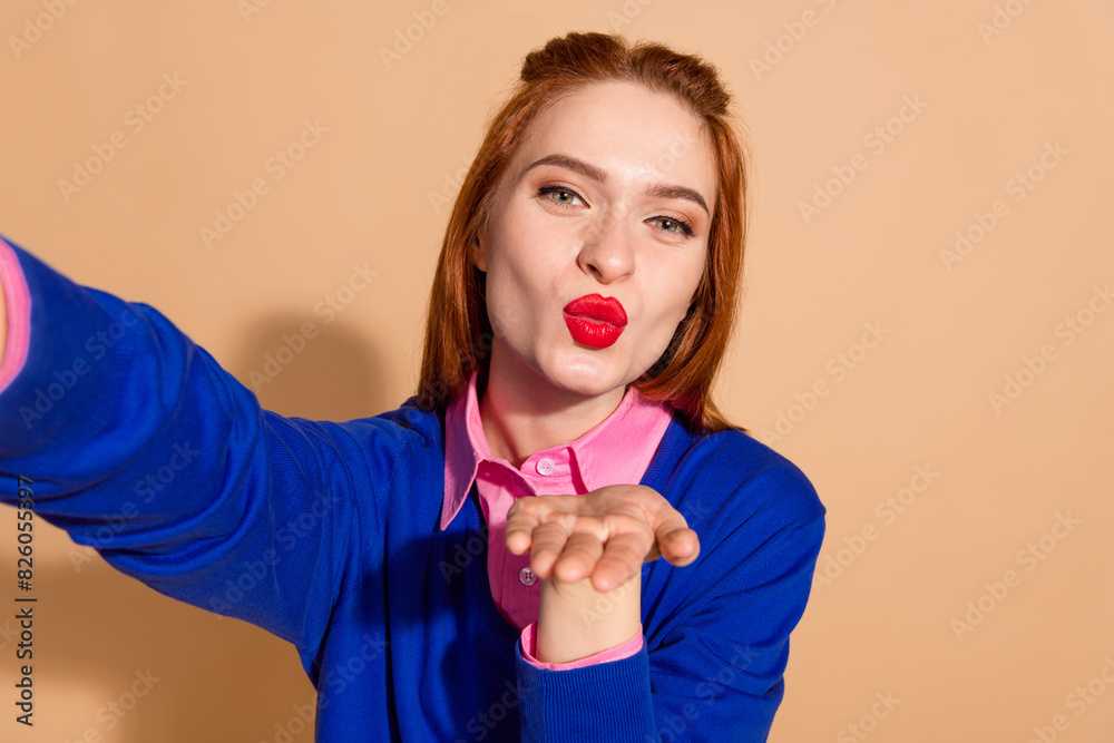 Canvas Prints Photo of positive funky lady wear blue jumper recording video vlog sending arm kiss isolated beige color background