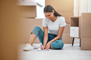 Woman, paperwork and new home with moving boxes for loan agreement or real estate, investment or...