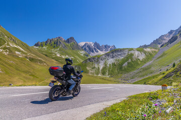 Motorbike on route des Grandes Alpes near Col du Galibier, Hautes-Alpes, France