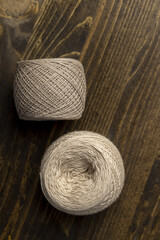 close-up of a ball of light-colored thread for needlework