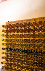 Stored wine bottles, wine cella, Canale, Piedmont, Italy