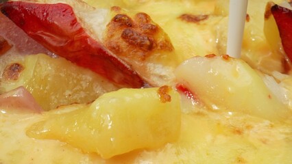 Classic Combo: Cheese, pineapple, and crab sticks on a delicious pizza. Perfectly sweet and savory. Cooking and recipes concept. Pizza background. 
