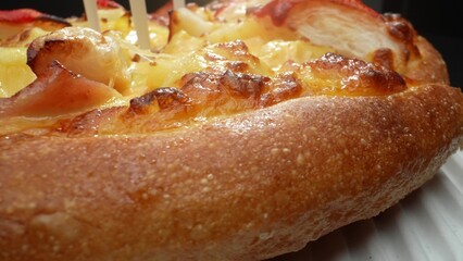 Dive into a seafood paradise with cheese, pineapple, and crab sticks, delivering a taste of the sea with a touch of sweetness. Dining and flavor concept. Pizza background. 
