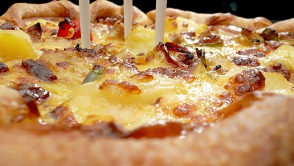Dive into the delicious details of a sizzling sausage and cheese pizza in this captivating macro....