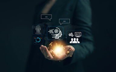 Businessman chatting with AI. The concept of inserting commands to allow artificial intelligence to create something from data. Future technology. Using AI to help in work.