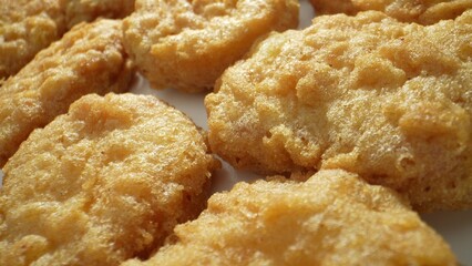 A chicken nugget is a small, deep-fried piece of chicken that is usually coated in batter or...