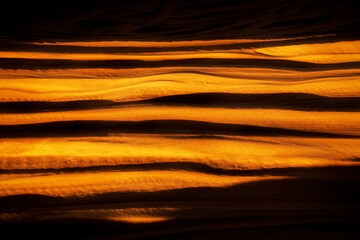 Contrast abstract background of sand in desert in Unted Arab Emirates. Orange sand in desert.