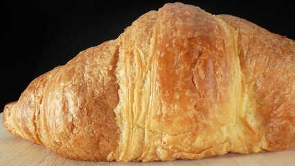Croissants are generally low in essential nutrients such as vitamins, minerals, and fiber. This means they do not offer much in terms of nutritional value beyond providing energy. Food background. 
