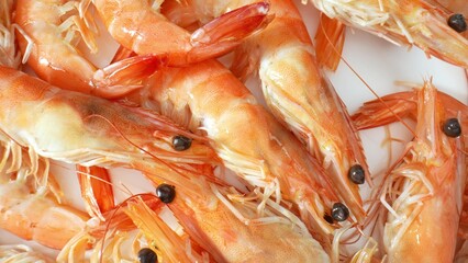 Shell-on cooked shrimp can be boiled, steamed, grilled, or sautéed, preserving moisture and...