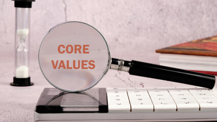 Copy space. Business and core values concept. The Core Values text through a magnifying glass on a...